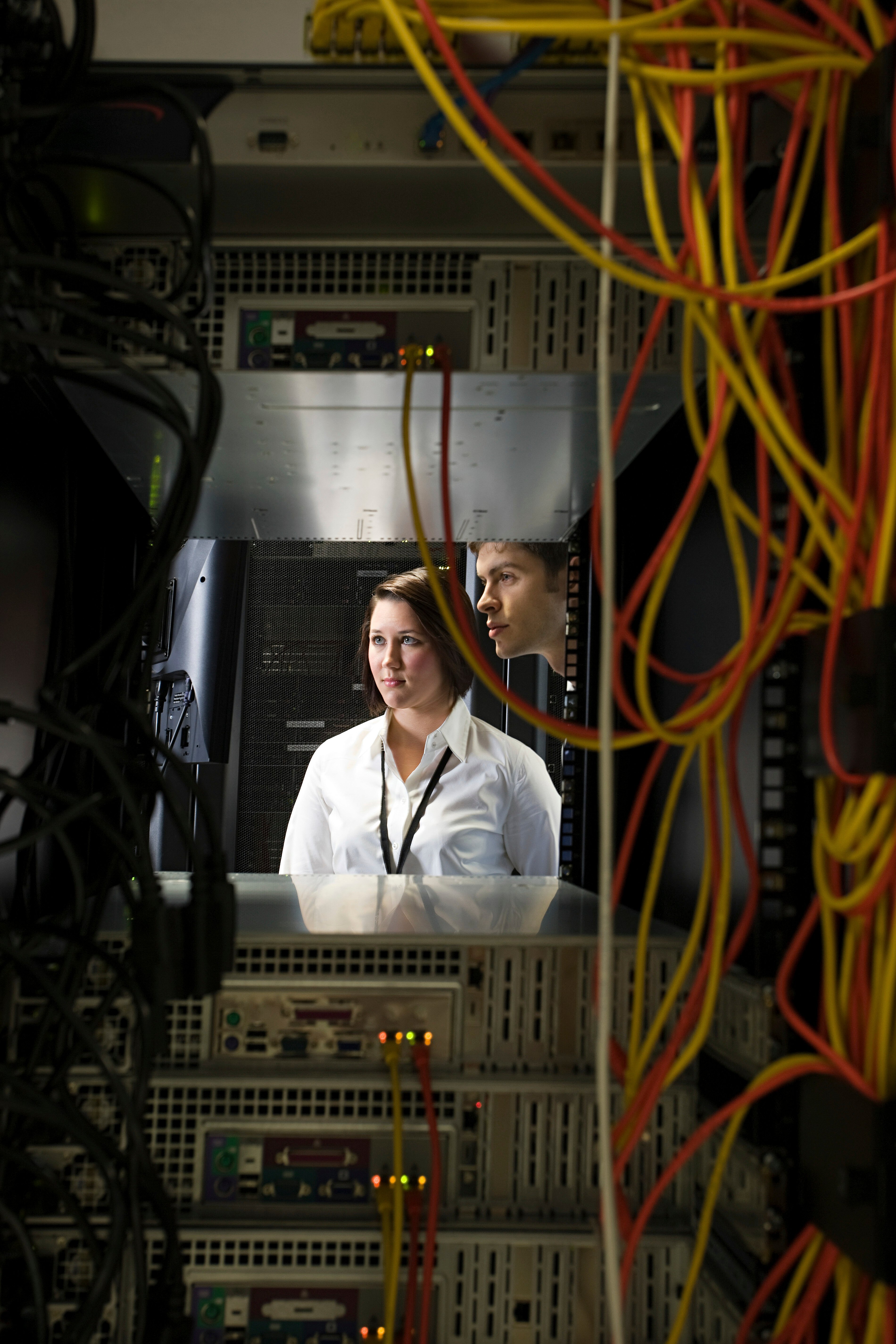 two-professionals-troubleshooting-in-a-server-room-2025-04-03-18-05-19-utc