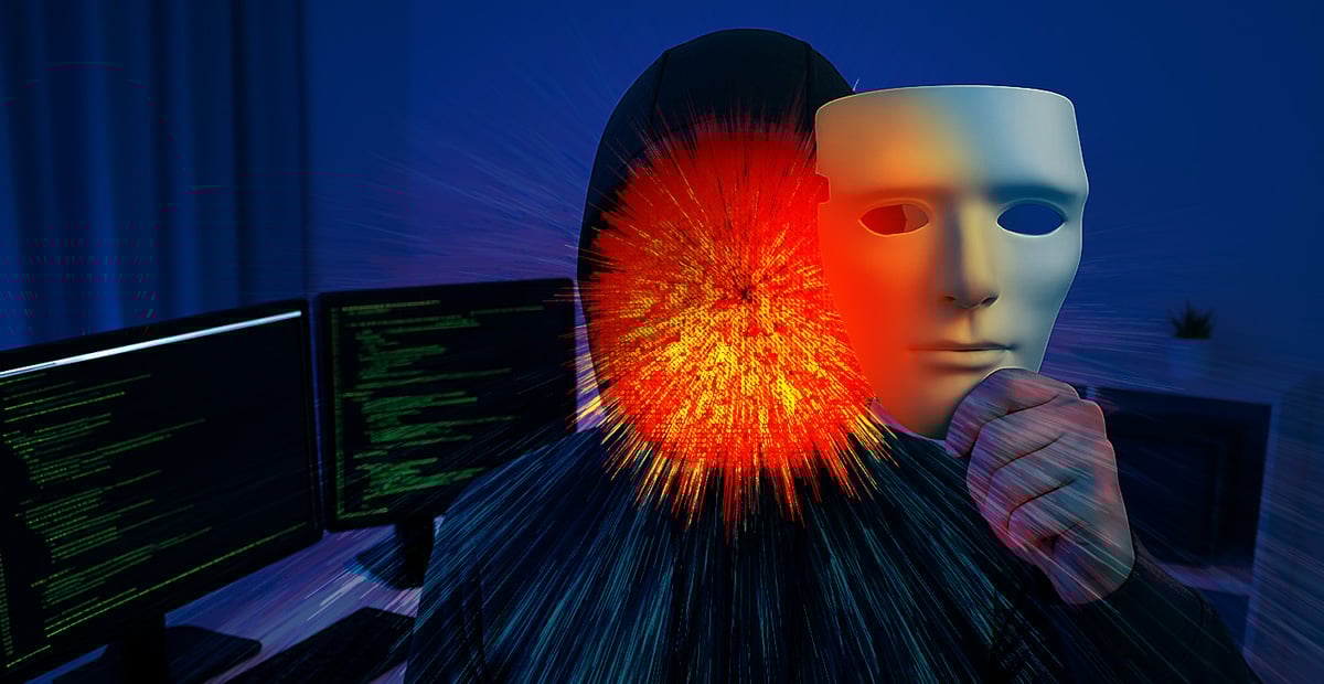 Hacker holding a mask beside computer code, symbolizing AI-powered cyberattacks and the growing threat to businesses.