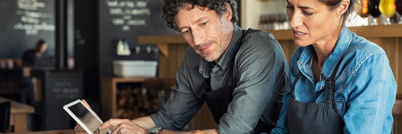 business owners going through their IT and cybersecurity