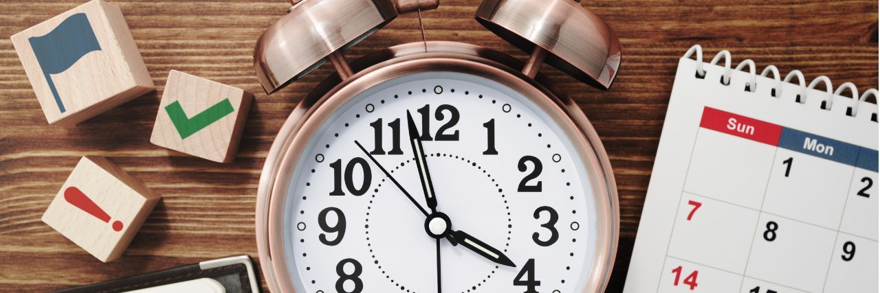 an alarm clock signifying a scheduled vulnerability scan