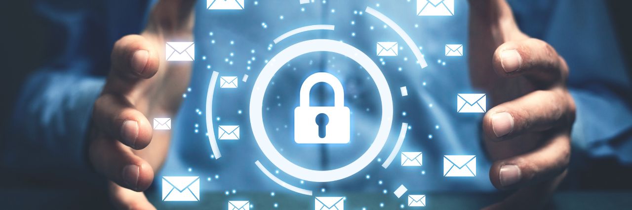 A pair of hands holding out an encryption for multiple emails