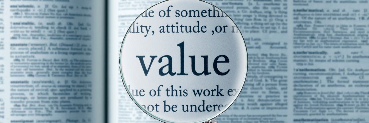 the word value magnified under a magnifying glass