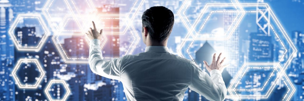 An IT technician looking over the IT Model