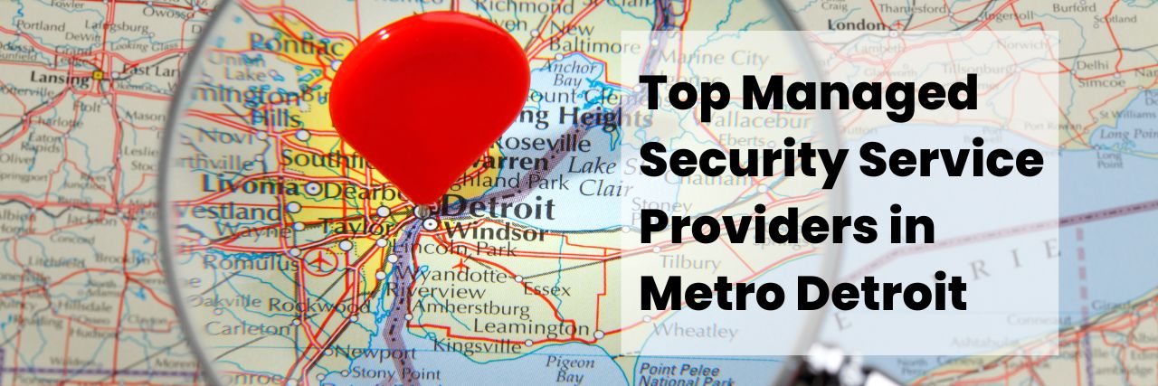 A map with a pin on Detroit and a magnifying glass 