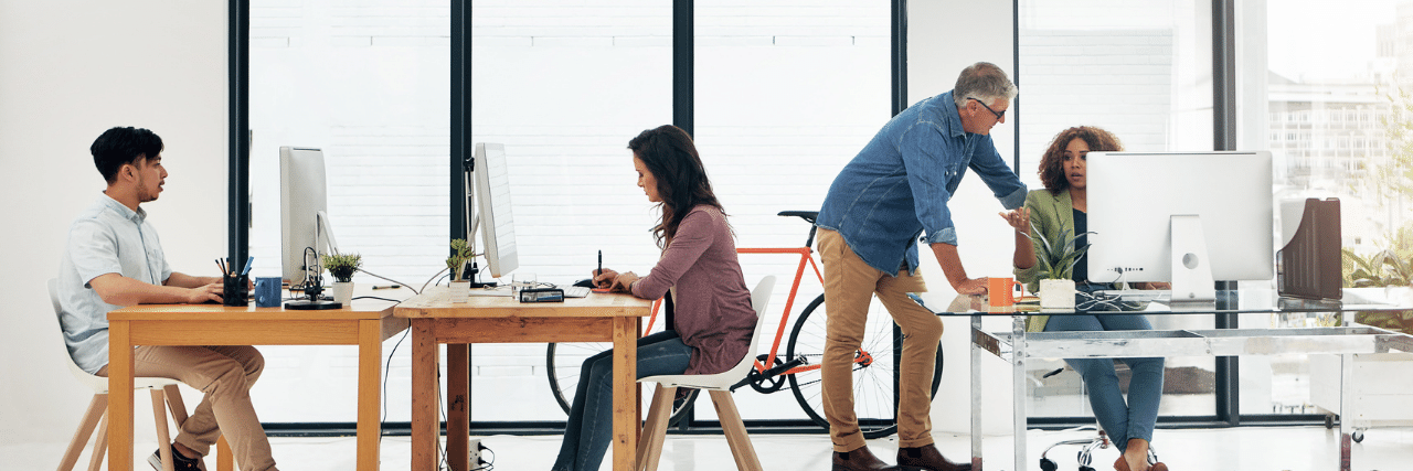 People in the office needing help with their IT
