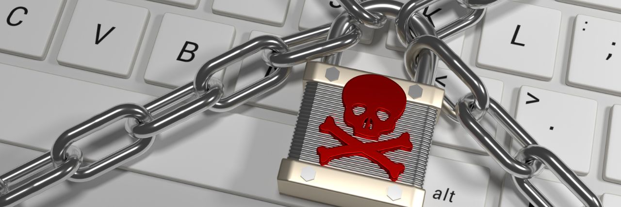 a chained keyboard with ransomware padlock