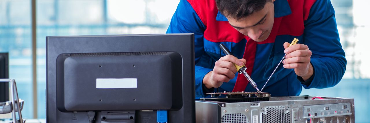 A one-person IT team fixing an IT problem
