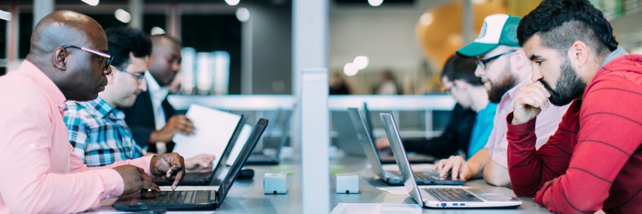 a group of employees using their own devices for work