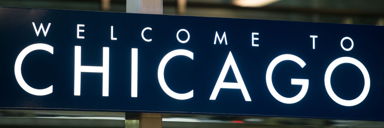 a signage saying welcome to Chicago