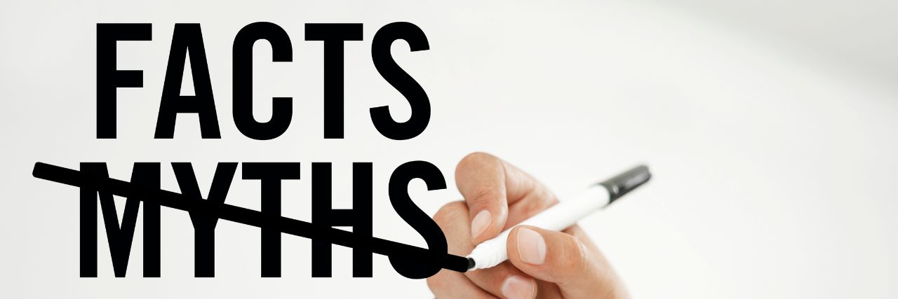 a person crossing out the word myths below the word facts