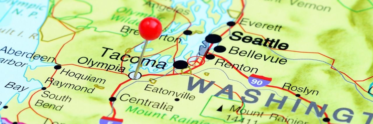 a red pin on the map pinned on Olympia in Washington