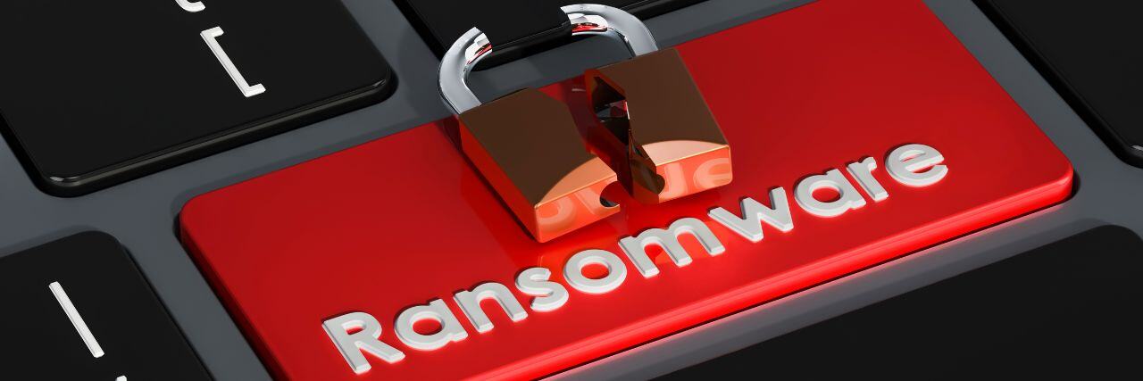 the word ransomware used as a keyboard key with a broken padlock on top