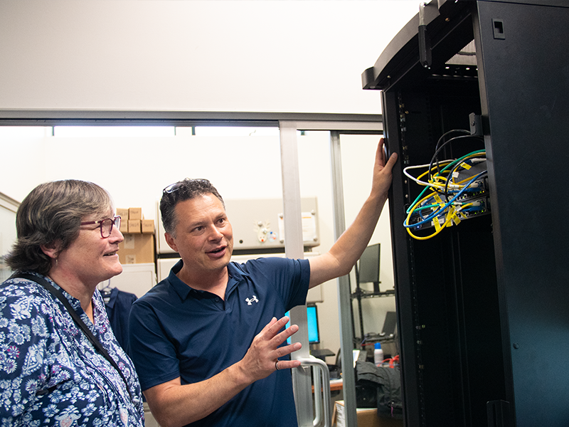 An ITS client team working with managed technology in place