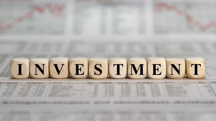 the word investment spelled out using blocks