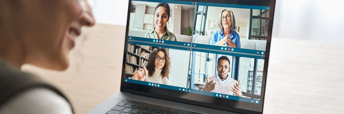 A laptop with a video conference on going