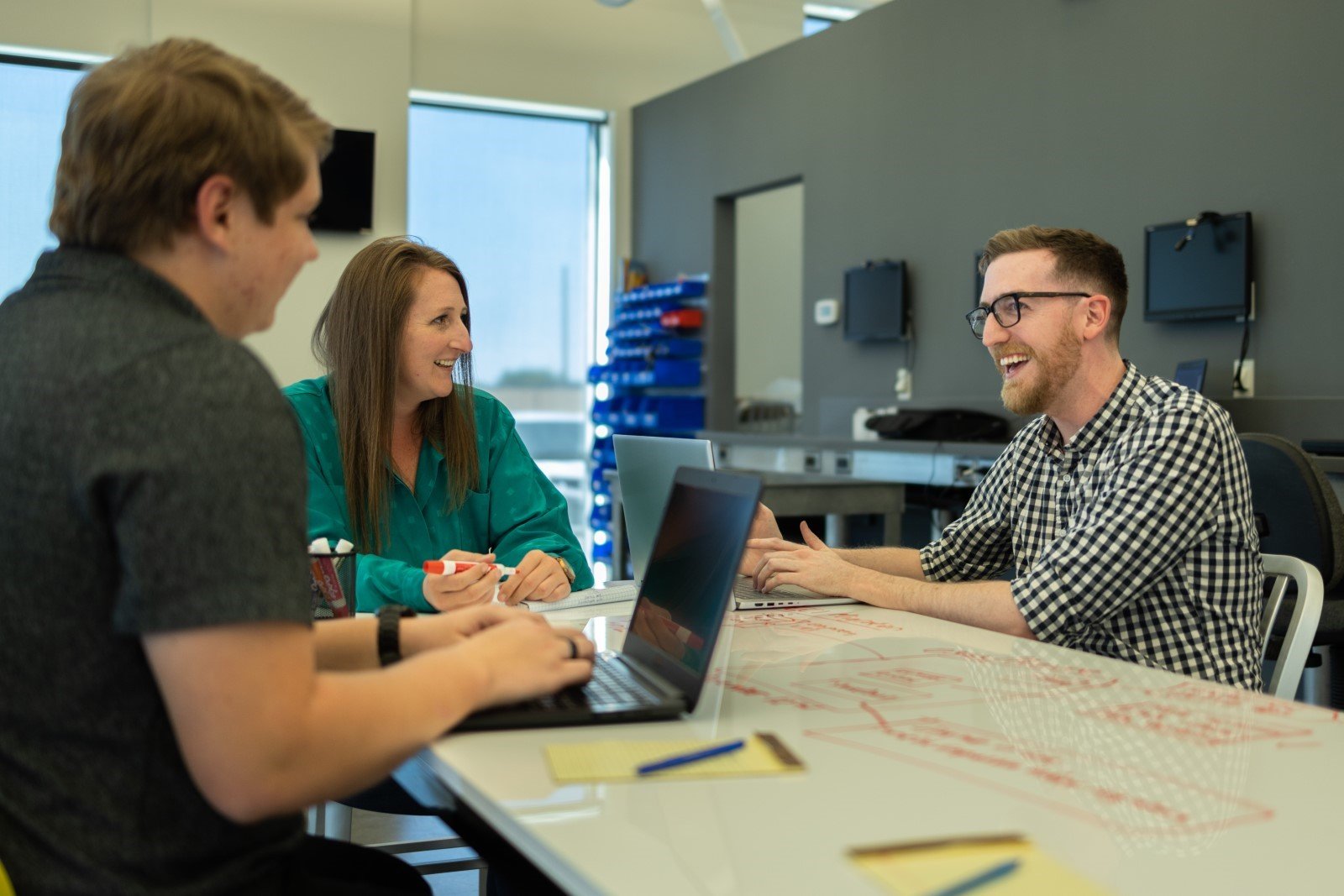 a group of MSP technicians discussing an issue